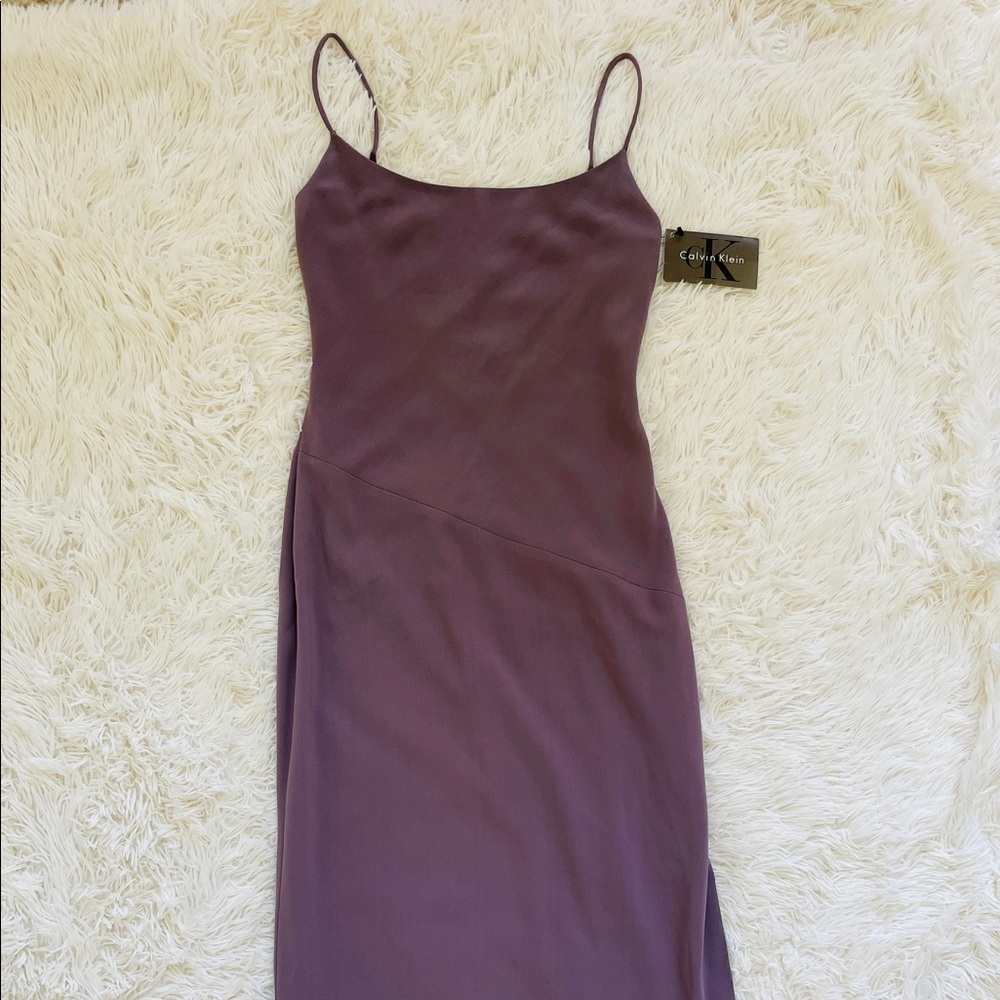Calvin Klein extra long dress NWT but extremely tiny peeling shown in pictures